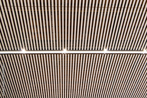 Structure modern ceiling with light bulbs lighting with ventilation pipes in airport station. Contemporary transportation hub, infrastructure, and urban development concept. Modern architecture design
