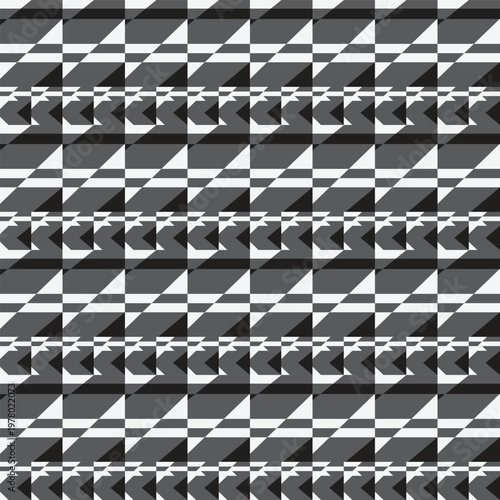 Modern geometric pattern in black, white, and grey. Sharp angular seamless design for textiles and backgrounds.