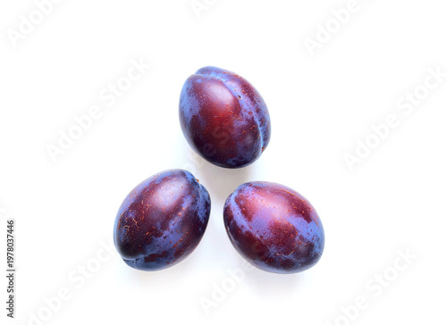 Plums isolated on white background.