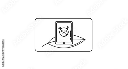 Tablet with dog face app on leaf, technology and nature concept