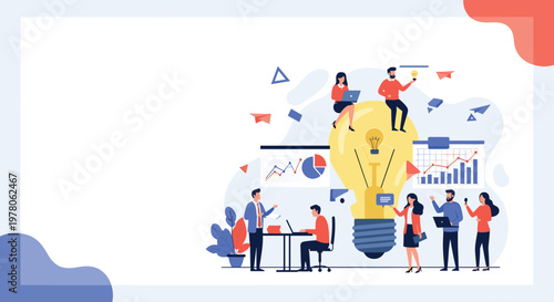 Creative business team working together around a giant glowing light bulb to brainstorm new ideas and innovative solutions.