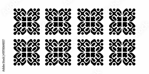 Geometric floral pattern repeats in a symmetrical black and white design