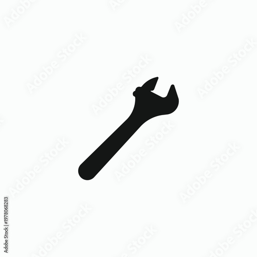 Simple wrench icon in dark gray tone. Minimalist design with clean lines and soft background. Perfect for repair, maintenance, or technical themes. Use in app icons, toolkits, or DIY project guides