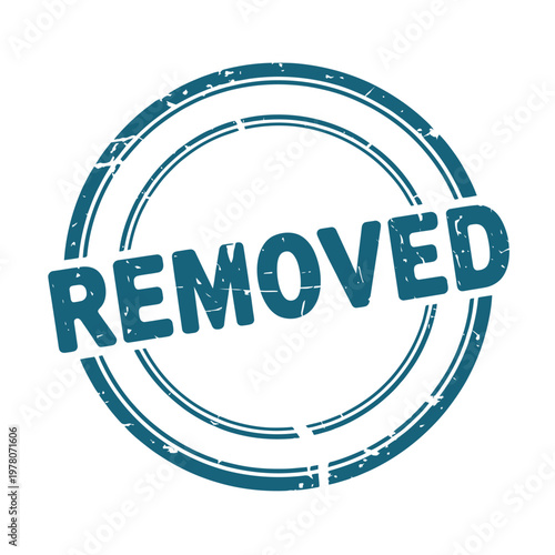 A circular teal colored stamp displaying the word removed in bold text