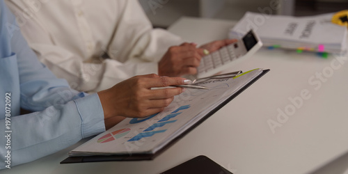 Detailed financial review with charts and reports