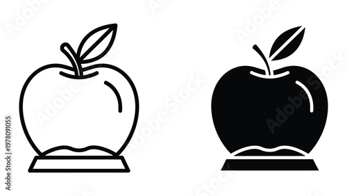 Contrast between a white apple illustration and a black apple illustration on pedestals