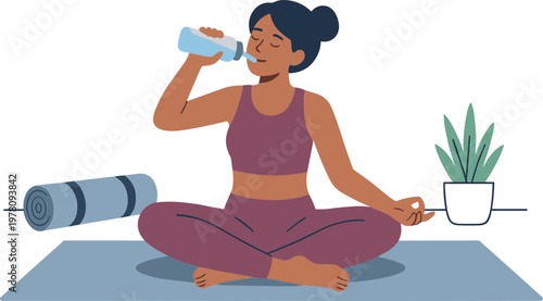 Woman sits on yoga mat drinking water from bottle in serene indoor setting