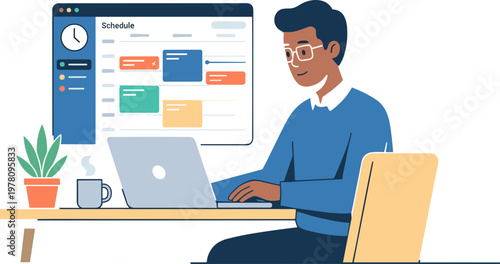 A man sits at a desk working on a laptop with a schedule on the screen