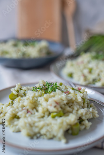 Spring food; Delicious risotto with asparagus and wild garlic