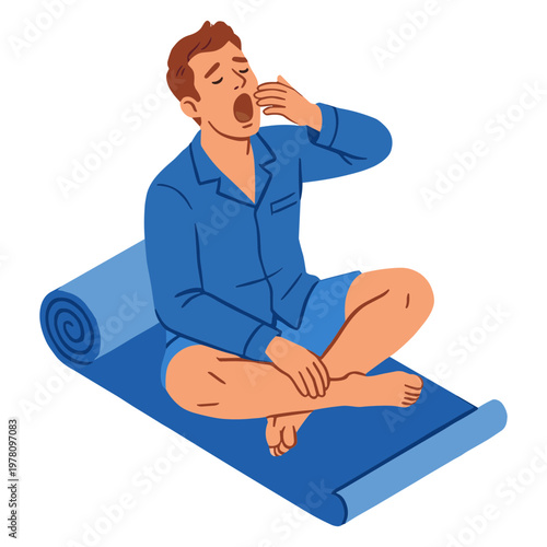 Man yawning on a yoga mat in the morning