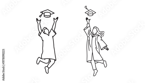 Two graduates in caps and gowns throwing their graduation caps in the air