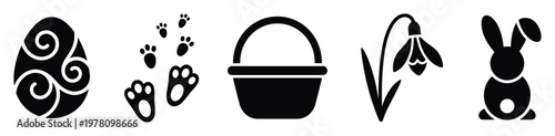Essential collection of black and white spring and Easter holiday icons featuring a decorated egg, rabbit footprints, a basket, a snowdrop flower, and a cute bunny, perfect for seasonal