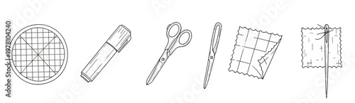 Collection of essential sewing and crafting tools including a cutting mat, marker, scissors, seam ripper, fabric, and needle, perfect for textile hobbies and DIY projects.