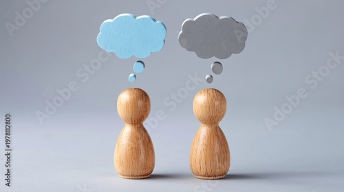 Wooden peg people with colorful thought bubbles closeup