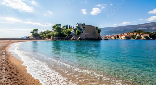 Scenic Coastal Landscape with Turquoise Water and Sandy Beach Under a Blue Sky.