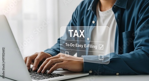 Person typing on laptop with digital tax filing checklist overlay e-filing online computer