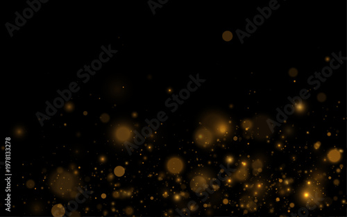 Golden sparkles drift on transparent background. Soft glowing dust forms elegant texture. Perfect festive luxury overlay design light.