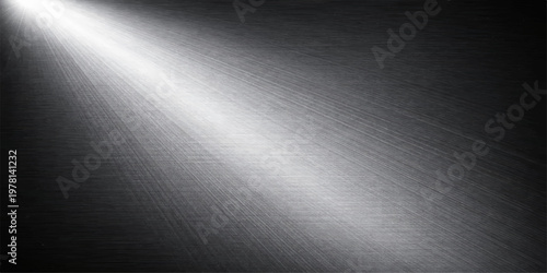 Brushed stainless steel metal texture with a shiny silver aluminum surface and industrial chrome pattern creating a grey metallic background for a sleek dark plate backdrop