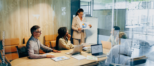 Team engaging in creative activity using whiteboard and sticky notes