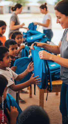 Generous Volunteer Donates School Backpack to Happy Child in Community Program