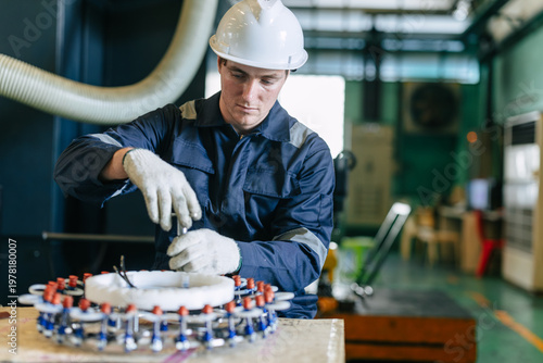 Fotografie Technician male work precision fix configuration service maintenance Plastic Inj