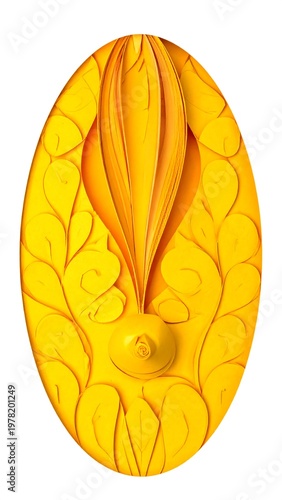 A yellow oval object with a floral design and central protrusion