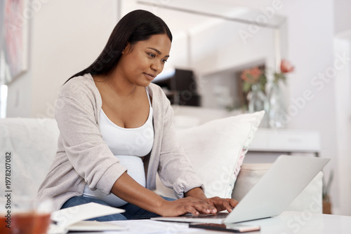фотографія Reading, typing or pregnant woman with laptop on couch, maternity forum or research on fetus development