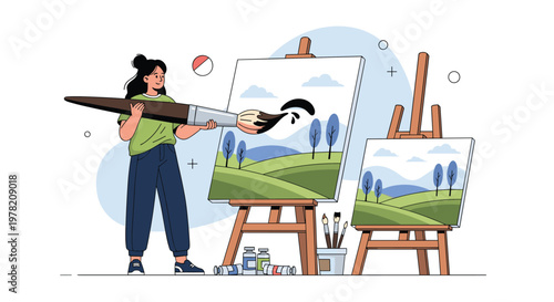 Creative woman uses a giant paintbrush to paint a beautiful green landscape on an easel in her bright art studio.