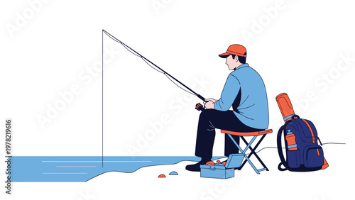 Fisherman sits quietly on a folding chair at the water edge while casting his fishing rod on a calm day at the beach or lake shore.