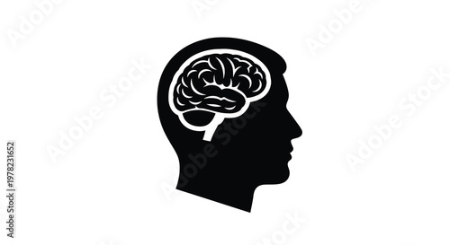 A black silhouette of a human head with a detailed brain inside