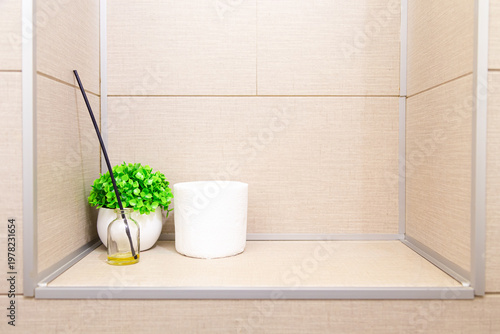 Foto Toilet accessories placed in a wall niche