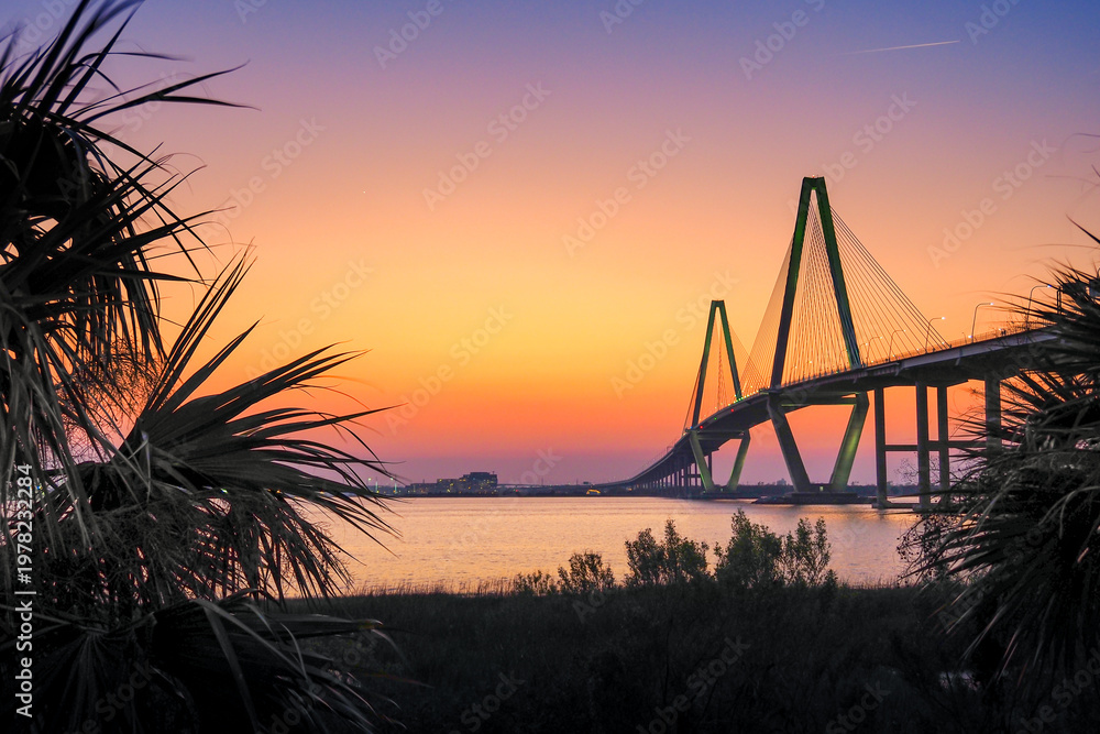 Fototapeta premium sunset view of the Ravenel Bridge across the Cooper River in Charleston
