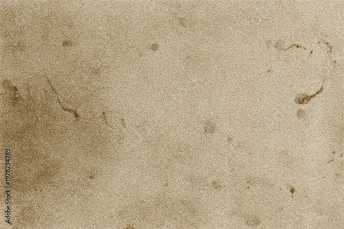 Sepia toned textured paper with dark spots