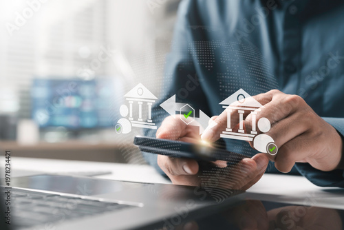 Online banking, digital finance, money transfer security concept. Businessman using smartphone with mobile banking application for transfer deposit and global fintech transaction. Finance business.