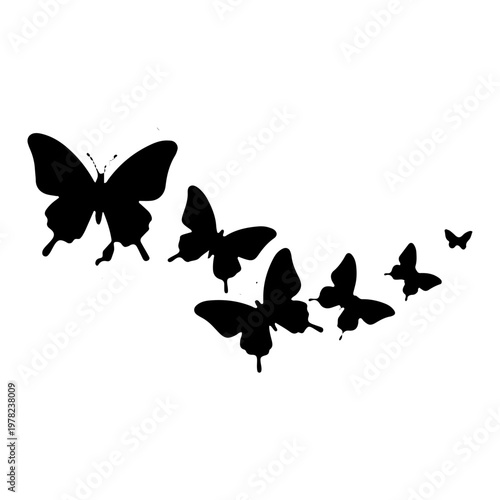 Flying black butterfly silhouettes group