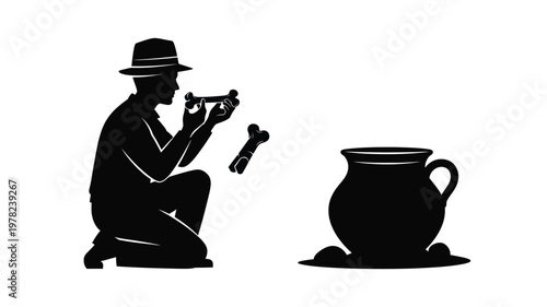 Archaeologist examining artifacts near a pot a dramatic silhouette