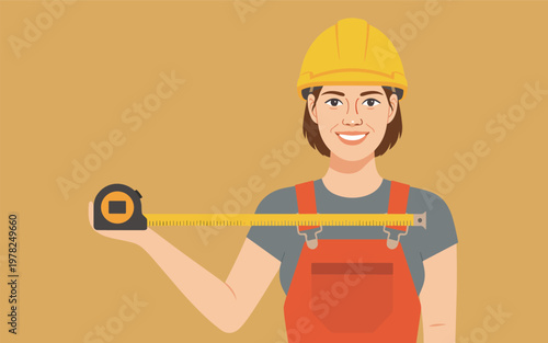 A woman wearing an orange jumpsuit and yellow hard hat measures distance with tape.