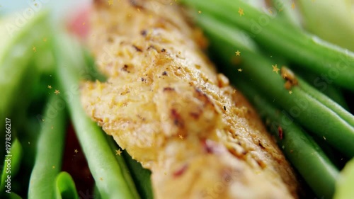 Camera sliding, revealing fillet, avocado and beans for food marketing with star glitter overlay