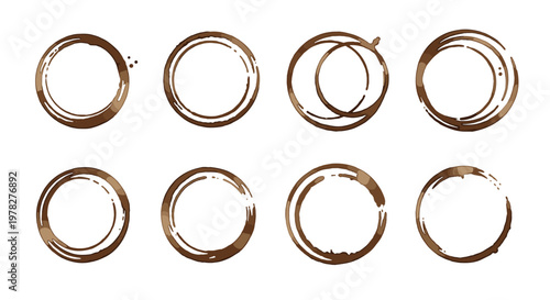 Another collection of brown coffee cup stains shows various circular marks and splatters from beverages for texture or background effects.