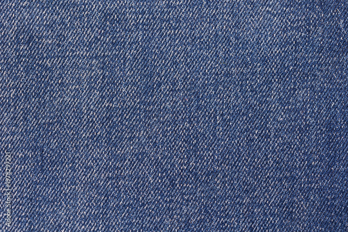 Blank denim cloth textile background. Soft fabric, flat cotton surface. Grunge structure design. Dark navy or blue material. Indigo vintage style