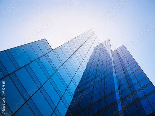 Architecture details Glass wall Modern building exterior Abstract background Low angle view