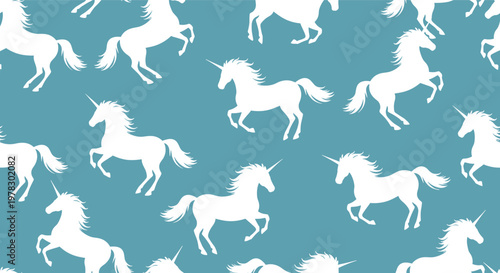Seamless pattern of white unicorn silhouettes in various active poses on a solid blue background for children's designs or fantasy.