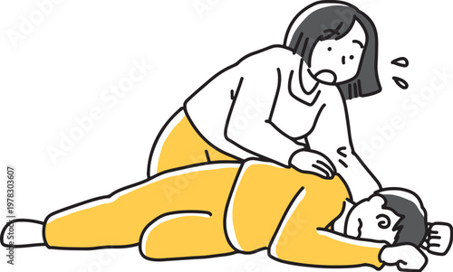 倒れている男性を心配する女性