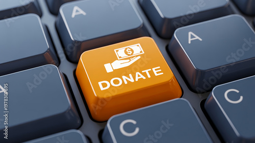 An orange donate button with a money icon on a computer keyboard for online giving