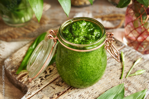 Pesto made of wild garlic or ramson leaves in a jar