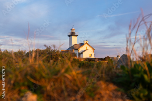Pontusval lighthouse, Brittany, France. Sunrise coastal view, travel and tourism banner