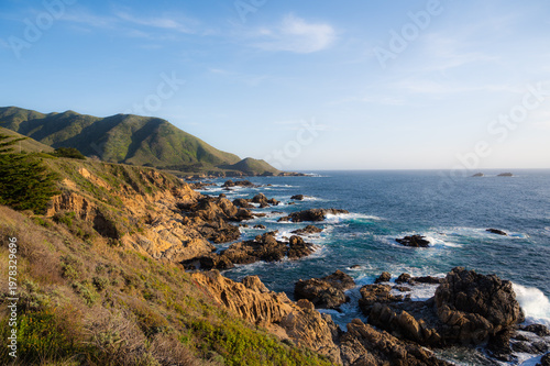 Sunset landscape view of the coast on highway 1, big sur. Travel and tourism banner with copy space