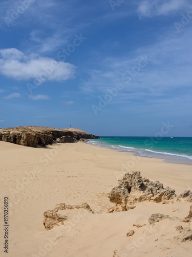 Beach and cliffs on the Atlantic coast. Clear day. Boa Vista Island, Cape Verde.