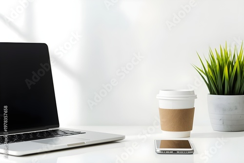 Clean Minimal Desk Setup with Laptop, Coffee, Plant and Smartphone, Modern Work from Home Concept