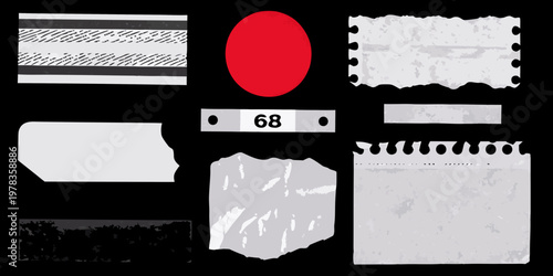 Assorted torn paper scraps and a red oval shape on a black background